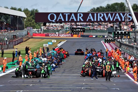 Nico Hulkenberg (GER) Sauber C45 and Oliver Bearman (GBR) Haas VF-25 at the back of the grid before the start of the race.
06.07.2025. Formula 1 World Championship, Rd 12, British Grand Prix, Silverstone, England, Race Day.
- www.xpbimages.com, EMail: requests@xpbimages.com © Copyright: Moy / XPB Images