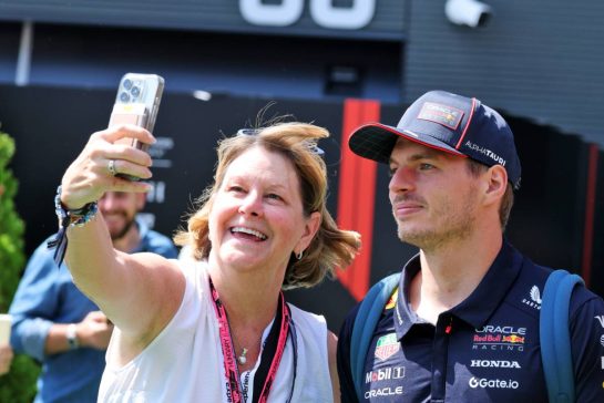 Max Verstappen (NLD) Red Bull Racing (Right) with a fan.
01.08.2025. Formula 1 World Championship, Rd 14, Hungarian Grand Prix, Budapest, Hungary, Practice Day.
- www.xpbimages.com, EMail: requests@xpbimages.com © Copyright: Moy / XPB Images