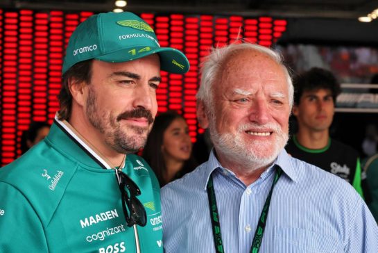 (L to R): Fernando Alonso (ESP) Aston Martin F1 Team on the drivers' parade with Andras Arato (HUN) Retired Electrician and Hide the Pain Harold meme.
03.08.2025. Formula 1 World Championship, Rd 14, Hungarian Grand Prix, Budapest, Hungary, Race Day.
- www.xpbimages.com, EMail: requests@xpbimages.com © Copyright: Moy / XPB Images