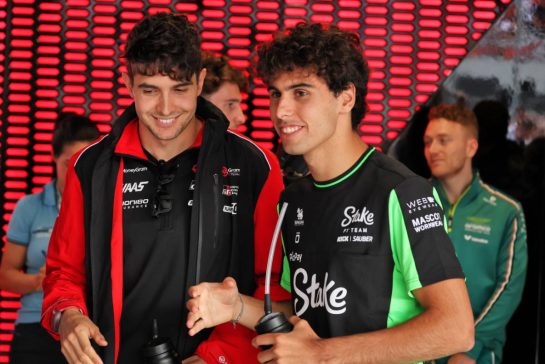 (L to R): Esteban Ocon (FRA) Haas F1 Team with Gabriel Bortoleto (BRA) Sauber on the drivers' parade.
03.08.2025. Formula 1 World Championship, Rd 14, Hungarian Grand Prix, Budapest, Hungary, Race Day.
- www.xpbimages.com, EMail: requests@xpbimages.com © Copyright: Moy / XPB Images