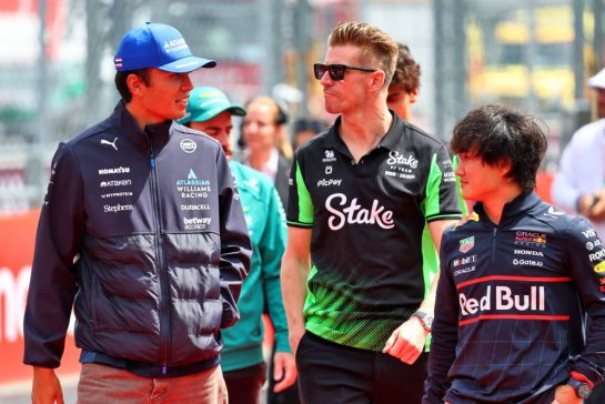 (L to R): Alexander Albon (THA) Atlassian Williams Racing with Nico Hulkenberg (GER) Sauber and Yuki Tsunoda (JPN) Red Bull Racing on the drivers' parade.
03.08.2025. Formula 1 World Championship, Rd 14, Hungarian Grand Prix, Budapest, Hungary, Race Day.
- www.xpbimages.com, EMail: requests@xpbimages.com © Copyright: Batchelor / XPB Images