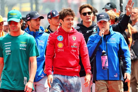 (L to R): Charles Leclerc (MON) Ferrari with Franco Colapinto (ARG) Alpine F1 Team on the drivers' parade.
03.08.2025. Formula 1 World Championship, Rd 14, Hungarian Grand Prix, Budapest, Hungary, Race Day.
- www.xpbimages.com, EMail: requests@xpbimages.com © Copyright: Batchelor / XPB Images