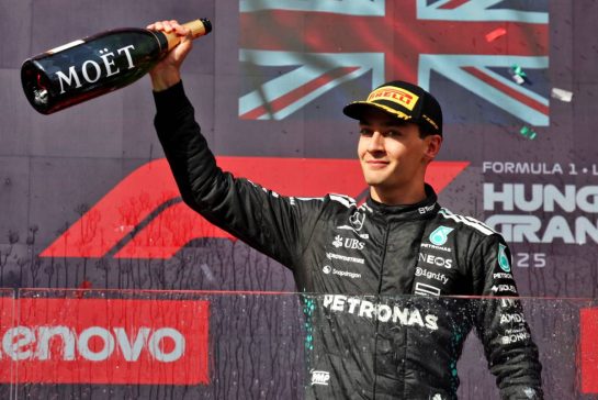 George Russell (GBR) Mercedes AMG F1 celebrates his third position on the podium.
03.08.2025. Formula 1 World Championship, Rd 14, Hungarian Grand Prix, Budapest, Hungary, Race Day.
- www.xpbimages.com, EMail: requests@xpbimages.com © Copyright: Bearne / XPB Images