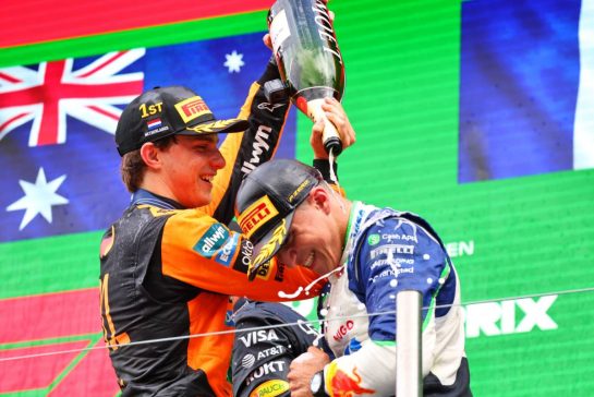 (L to R): Race winner Oscar Piastri (AUS) McLaren celebrates on the podium with third placed Isack Hadjar (FRA) Racing Bulls.
31.08.2025. Formula 1 World Championship, Rd 15, Dutch Grand Prix, Zandvoort, Netherlands, Race Day.
- www.xpbimages.com, EMail: requests@xpbimages.com © Copyright: Batchelor / XPB Images