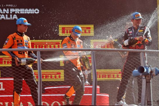 (L to R): Lando Norris (GBR) McLaren celebrates his second position on the podium with third placed Oscar Piastri (AUS) McLaren and race winner Max Verstappen (NLD) Red Bull Racing.
07.09.2025. Formula 1 World Championship, Rd 16, Italian Grand Prix, Monza, Italy, Race Day.
- www.xpbimages.com, EMail: requests@xpbimages.com © Copyright: Charniaux / XPB Images