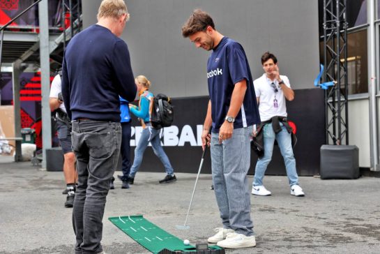 Pierre Gasly (FRA) Alpine F1 Team plays golf in the paddock with Simon Lazenby (GBR) Sky Sports F1 TV Presenter (Left).
18.09.2025. Formula 1 World Championship, Rd 17, Azerbaijan Grand Prix, Baku Street Circuit, Azerbaijan, Preparation Day.
- www.xpbimages.com, EMail: requests@xpbimages.com © Copyright: Rew / XPB Images