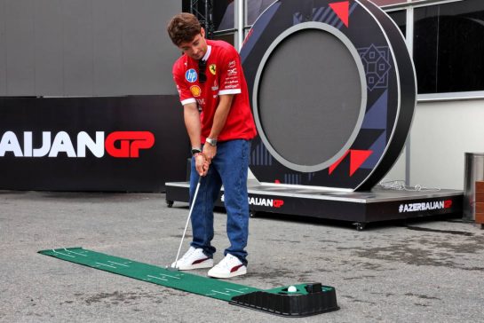 Charles Leclerc (MON) Ferrari plays golf in the paddock.
18.09.2025. Formula 1 World Championship, Rd 17, Azerbaijan Grand Prix, Baku Street Circuit, Azerbaijan, Preparation Day.
- www.xpbimages.com, EMail: requests@xpbimages.com © Copyright: Rew / XPB Images