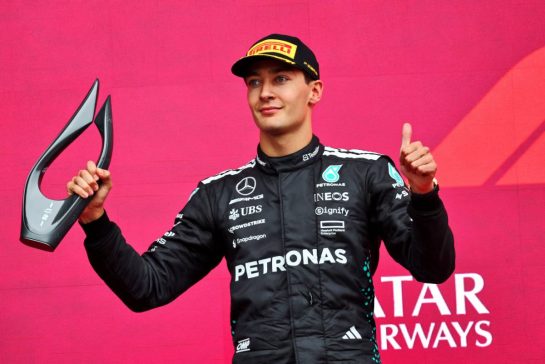 George Russell (GBR) Mercedes AMG F1 celebrates his second position on the podium.
21.09.2025. Formula 1 World Championship, Rd 17, Azerbaijan Grand Prix, Baku Street Circuit, Azerbaijan, Race Day.
- www.xpbimages.com, EMail: requests@xpbimages.com © Copyright: Batchelor / XPB Images