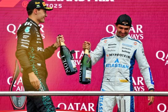 (L to R): George Russell (GBR) Mercedes AMG F1 celebrates his 2tpos on the podium with third placed Carlos Sainz (ESP) Atlassian Williams Racing.
21.09.2025. Formula 1 World Championship, Rd 17, Azerbaijan Grand Prix, Baku Street Circuit, Azerbaijan, Race Day.
- www.xpbimages.com, EMail: requests@xpbimages.com © Copyright: Batchelor / XPB Images