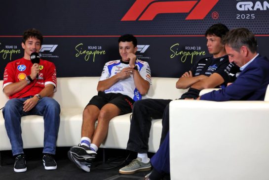(L to R): Charles Leclerc (MON) Ferrari; Isack Hadjar (FRA) Racing Bulls; and Alexander Albon (THA) Atlassian Williams Racing, in the FIA Press Conference.
02.10.2025. Formula 1 World Championship, Rd 18, Singapore Grand Prix, Marina Bay Street Circuit, Singapore, Preparation Day.
- www.xpbimages.com, EMail: requests@xpbimages.com © Copyright: Rew / XPB Images
