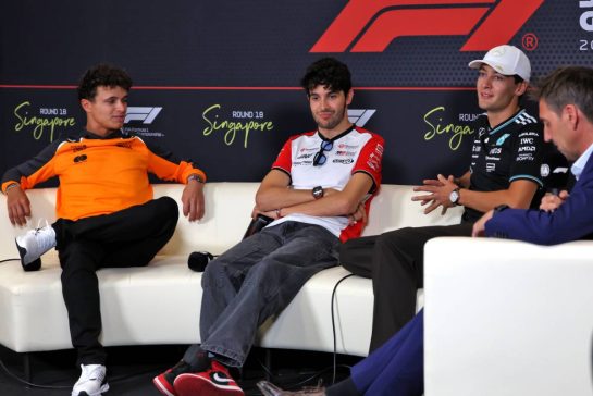 (L to R): Lando Norris (GBR) McLaren; Esteban Ocon (FRA) Haas F1 Team; and George Russell (GBR) Mercedes AMG F1, in the FIA Press Conference.
02.10.2025. Formula 1 World Championship, Rd 18, Singapore Grand Prix, Marina Bay Street Circuit, Singapore, Preparation Day.
- www.xpbimages.com, EMail: requests@xpbimages.com © Copyright: Rew / XPB Images