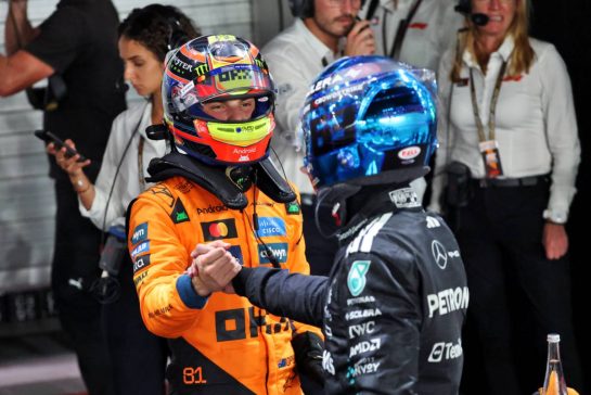 (L to R): Third placed Oscar Piastri (AUS) McLaren in qualifying parc ferme with pole sitter George Russell (GBR) Mercedes AMG F1.
04.10.2025. Formula 1 World Championship, Rd 18, Singapore Grand Prix, Marina Bay Street Circuit, Singapore, Qualifying Day.
- www.xpbimages.com, EMail: requests@xpbimages.com © Copyright: Batchelor / XPB Images