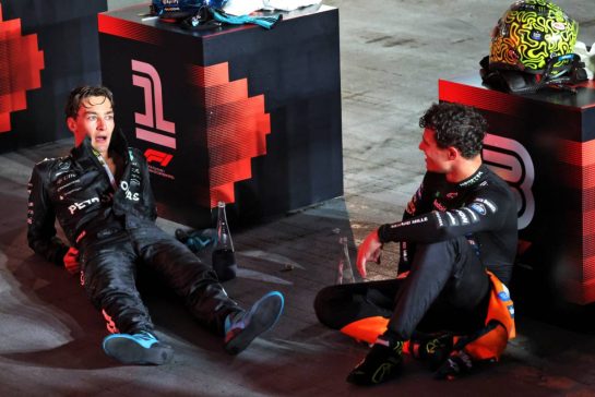 (L to R): Race winner George Russell (GBR) Mercedes AMG F1 in parc ferme with third placed Lando Norris (GBR) McLaren.
05.10.2025. Formula 1 World Championship, Rd 18, Singapore Grand Prix, Marina Bay Street Circuit, Singapore, Race Day.
- www.xpbimages.com, EMail: requests@xpbimages.com © Copyright: Batchelor / XPB Images