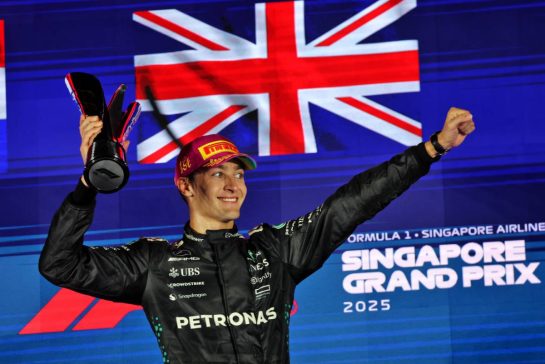 Race winner George Russell (GBR) Mercedes AMG F1 celebrates on the podium.
05.10.2025. Formula 1 World Championship, Rd 18, Singapore Grand Prix, Marina Bay Street Circuit, Singapore, Race Day.
- www.xpbimages.com, EMail: requests@xpbimages.com © Copyright: Batchelor / XPB Images
