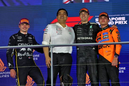 The podium (L to R):Max Verstappen (NLD) Red Bull Racing, second; George Russell (GBR) Mercedes AMG F1, race winner; Lando Norris (GBR) McLaren, third.
05.10.2025. Formula 1 World Championship, Rd 18, Singapore Grand Prix, Marina Bay Street Circuit, Singapore, Race Day.
- www.xpbimages.com, EMail: requests@xpbimages.com © Copyright: Batchelor / XPB Images