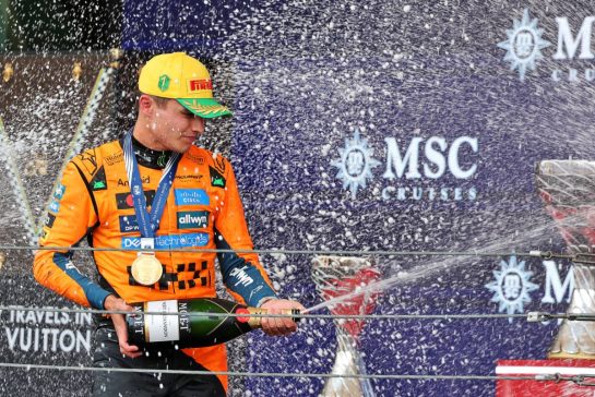 Race winner Lando Norris (GBR) McLaren celebrates on the podium.
09.11.2025. Formula 1 World Championship, Rd 21, Brazilian Grand Prix, Sao Paulo, Brazil, Race Day.
- www.xpbimages.com, EMail: requests@xpbimages.com © Copyright: Charniaux / XPB Images