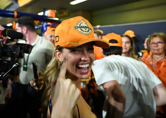 ABU DHABI, UNITED ARAB EMIRATES - DECEMBER 07: Magui Corceiro celebrates with the McLaren team during the F1 Grand Prix of Abu Dhabi at Yas Marina Circuit on December 07, 2025 in Abu Dhabi, United Arab Emirates. (Photo by Sam Bagnall/Sutton Images)