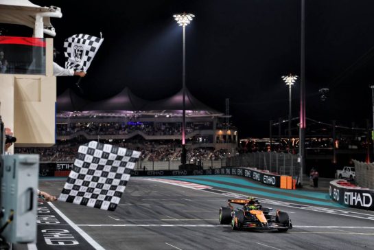 Third placed Lando Norris (GBR) McLaren MCL39 takes the chequered flag at the end of the race to win the World Championship.
07.12.2025. Formula 1 World Championship, Rd 24, Abu Dhabi Grand Prix, Yas Marina Circuit, Abu Dhabi, Race Day.
- www.xpbimages.com, EMail: requests@xpbimages.com © Copyright: Batchelor / XPB Images