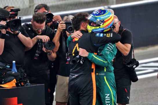 (L to R): Third placed World Champion Lando Norris (GBR) McLaren with Fernando Alonso (ESP) Aston Martin F1 Team.
07.12.2025. Formula 1 World Championship, Rd 24, Abu Dhabi Grand Prix, Yas Marina Circuit, Abu Dhabi, Race Day.
- www.xpbimages.com, EMail: requests@xpbimages.com © Copyright: Batchelor / XPB Images