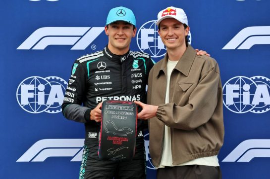(L to R): George Russell (GBR) Mercedes AMG Formula One Team receives the Pirelli Pole Position Award from Scotty James (AUS) Snowboarder in qualifying parc ferme.
07.03.2026. Formula 1 World Championship, Rd 1, Australian Grand Prix, Albert Park, Melbourne, Australia, Qualifying Day.
- www.xpbimages.com, EMail: requests@xpbimages.com © Copyright: Batchelor / XPB Images