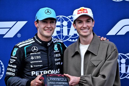 (L to R): George Russell (GBR) Mercedes AMG Formula One Team receives the Pirelli Pole Position Award from Scotty James (AUS) Snowboarder in qualifying parc ferme.
07.03.2026. Formula 1 World Championship, Rd 1, Australian Grand Prix, Albert Park, Melbourne, Australia, Qualifying Day.
- www.xpbimages.com, EMail: requests@xpbimages.com © Copyright: Price	/ XPB Images