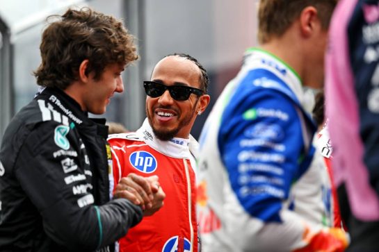 (L to R): Andrea Kimi Antonelli (ITA) Mercedes AMG Formula One Team with Lewis Hamilton (GBR) Scuderia Ferrari on the drivers' parade.
08.03.2026. Formula 1 World Championship, Rd 1, Australian Grand Prix, Albert Park, Melbourne, Australia, Race Day.
- www.xpbimages.com, EMail: requests@xpbimages.com © Copyright: Price / XPB Images