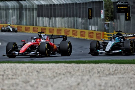 Charles Leclerc (MON) Scuderia Ferrari SF-26 and George Russell (GBR) Mercedes AMG Formula One Team W17 battle for position.
08.03.2026. Formula 1 World Championship, Rd 1, Australian Grand Prix, Albert Park, Melbourne, Australia, Race Day.
- www.xpbimages.com, EMail: requests@xpbimages.com © Copyright: Bearne / XPB Images