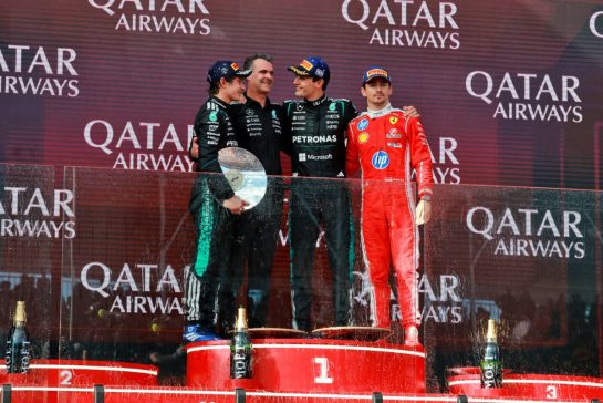 The podium (L to R): Andrea Kimi Antonelli (ITA) Mercedes AMG Formula One Team, second; Hywel Thomas (GBR) Mercedes AMG High Performance Powertrains Managing Director; George Russell (GBR) Mercedes AMG Formula One Team, race winner; Charles Leclerc (MON) Scuderia Ferrari, third.
08.03.2026. Formula 1 World Championship, Rd 1, Australian Grand Prix, Albert Park, Melbourne, Australia, Race Day.
- www.xpbimages.com, EMail: requests@xpbimages.com © Copyright: Moy / XPB Images