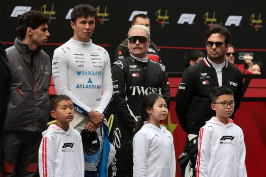 (L to R): Gabriel Bortoleto (BRA) Audi F1 Team; Alexander Albon (THA) Williams F1 Team; Valtteri Bottas (FIN) Cadillac Formula 1 Team; and Sergio Perez (MEX) Cadillac Formula 1 Team, on the grid.
15.03.2026. Formula 1 World Championship, Rd 2, Chinese Grand Prix, Shanghai, China, Race Day.
- www.xpbimages.com, EMail: requests@xpbimages.com © Copyright: Moy / XPB Images