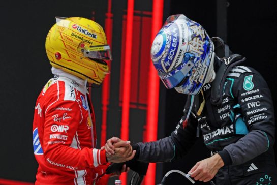 (L to R): Lewis Hamilton (GBR) Scuderia Ferrari celebrates with George Russell (GBR) Mercedes AMG Formula One Team in parc ferme.
15.03.2026. Formula 1 World Championship, Rd 2, Chinese Grand Prix, Shanghai, China, Race Day.
- www.xpbimages.com, EMail: requests@xpbimages.com © Copyright: Moy / XPB Images