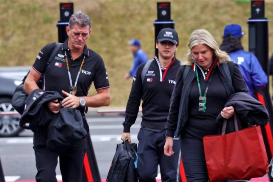 (L to R): Graeme Lowdon (GBR) Cadillac Formula 1 Team, Team Principal with Zhou Guanyu (CHN) Cadillac Formula 1 Team Reserve Driver and Laura Marchant (GBR) Cadillac Formula 1 Team Executive Assistant.
26.03.2026. Formula 1 World Championship, Rd 3, Japanese Grand Prix, Suzuka, Japan, Preparation Day.
- www.xpbimages.com, EMail: requests@xpbimages.com © Copyright: Rew / XPB Images