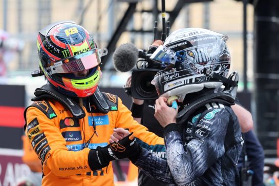 (L to R): Third placed Oscar Piastri (AUS) McLaren F1 Team celebrates with pole sitter Andrea Kimi Antonelli (ITA) Mercedes AMG Formula One Team in qualifying parc ferme.
28.03.2026. Formula 1 World Championship, Rd 3, Japanese Grand Prix, Suzuka, Japan, Qualifying Day.
- www.xpbimages.com, EMail: requests@xpbimages.com © Copyright: Charniaux / XPB Images