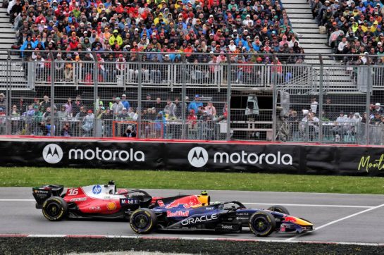 Isack Hadjar (FRA) Red Bull Racing RB22 and Charles Leclerc (MON) Scuderia Ferrari SF-26 battle for position.
24.05.2026. Formula 1 World Championship, Rd 5, Canadian Grand Prix, Montreal, Canada, Race Day.
- www.xpbimages.com, EMail: requests@xpbimages.com © Copyright: Moy / XPB Images