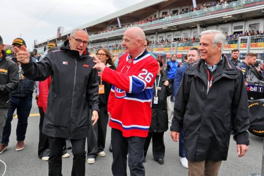 (L to R): Stefano Domenicali (ITA) Formula One President and CEO with Gianni Infantino (SUI) / (ITA) FIFA President and Robert R. Bennett (USA) Vice Chairman of the Board of Directors of Liberty Media on the grid.
24.05.2026. Formula 1 World Championship, Rd 5, Canadian Grand Prix, Montreal, Canada, Race Day.
- www.xpbimages.com, EMail: requests@xpbimages.com © Copyright: Moy / XPB Images