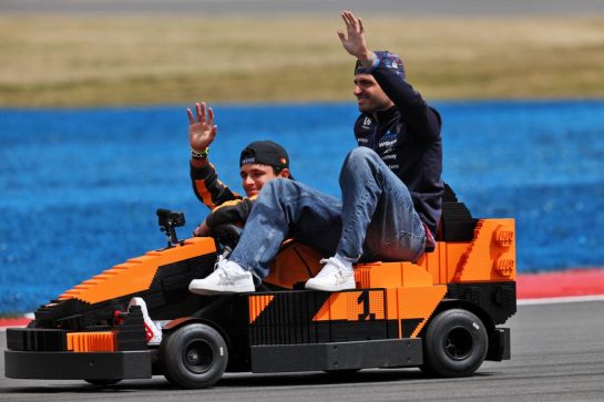 Lando Norris (GBR) McLaren F1 Team and Carlos Sainz (ESP) Williams F1 Team in a Lego kart on the drivers' parade.
05.07.2026. Formula 1 World Championship, Rd 9, British Grand Prix, Silverstone, England, Race Day.
- www.xpbimages.com, EMail: requests@xpbimages.com © Copyright: Charniaux / XPB Images