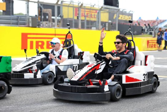 Esteban Ocon (FRA) Haas F1 Team; and Valtteri Bottas (FIN) Cadillac Formula 1 Team in Lego karts on the drivers' parade.
05.07.2026. Formula 1 World Championship, Rd 9, British Grand Prix, Silverstone, England, Race Day.
- www.xpbimages.com, EMail: requests@xpbimages.com © Copyright: Bearne / XPB Images