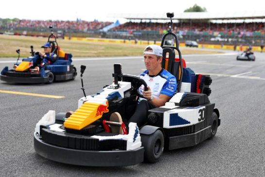 Liam Lawson (NZL) Racing Bulls Formula One Team in a Lego kart on the drivers' parade.
05.07.2026. Formula 1 World Championship, Rd 9, British Grand Prix, Silverstone, England, Race Day.
- www.xpbimages.com, EMail: requests@xpbimages.com © Copyright: Bearne / XPB Images