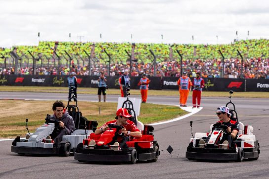 (L to R): Gabriel Bortoleto (BRA) Audi F1 Team with Charles Leclerc (MON) Scuderia Ferrari and Oliver Bearman (GBR) Haas F1 Team in Lego karts on the drivers' parade.
05.07.2026. Formula 1 World Championship, Rd 9, British Grand Prix, Silverstone, England, Race Day.
- www.xpbimages.com, EMail: requests@xpbimages.com © Copyright: Denny / XPB Images