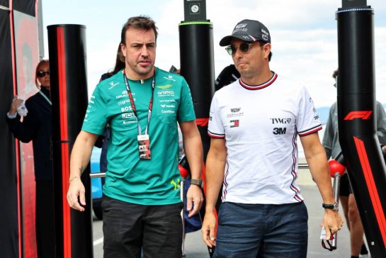 (L to R): Fernando Alonso (ESP) Aston Martin F1 Team with Sergio Perez (MEX) Cadillac Formula 1 Team.
24.07.2026. Formula 1 World Championship, Rd 11, Hungarian Grand Prix, Budapest, Hungary, Practice Day.
- www.xpbimages.com, EMail: requests@xpbimages.com © Copyright: Batchelor / XPB Images