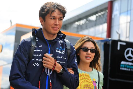 (L to R): Alexander Albon (THA) Williams F1 Team with his girlfriend Muni Lily He (CHN) Professional Golfer.
24.07.2026. Formula 1 World Championship, Rd 11, Hungarian Grand Prix, Budapest, Hungary, Practice Day.
- www.xpbimages.com, EMail: requests@xpbimages.com © Copyright: Moy / XPB Images