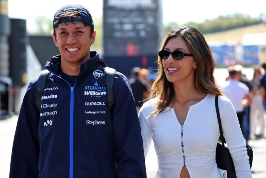 (L to R): Alexander Albon (THA) Williams F1 Team with his girlfriend Muni Lily He (CHN) Professional Golfer.
25.07.2026. Formula 1 World Championship, Rd 11, Hungarian Grand Prix, Budapest, Hungary, Qualifying Day.
- www.xpbimages.com, EMail: requests@xpbimages.com © Copyright: Rew / XPB Images