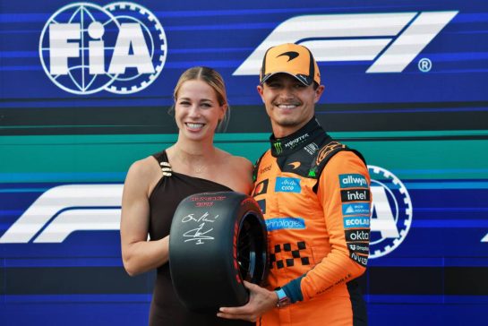 (L to R): Michelle Gulyas (HUN) Modern Pentathlete presents the Pirelli Pole Position Award to Lando Norris (GBR) McLaren F1 Team in qualifying parc ferme.
25.07.2026. Formula 1 World Championship, Rd 11, Hungarian Grand Prix, Budapest, Hungary, Qualifying Day.
- www.xpbimages.com, EMail: requests@xpbimages.com © Copyright: Charniaux / XPB Images
