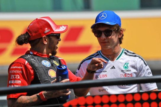(L to R): Lewis Hamilton (GBR) Scuderia Ferrari with Andrea Kimi Antonelli (ITA) Mercedes AMG Formula One Team on the drivers' parade.
26.07.2026. Formula 1 World Championship, Rd 11, Hungarian Grand Prix, Budapest, Hungary, Race Day.
- www.xpbimages.com, EMail: requests@xpbimages.com © Copyright: Charniaux / XPB Images