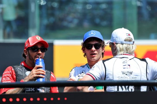 (L to R): Lewis Hamilton (GBR) Scuderia Ferrari; Andrea Kimi Antonelli (ITA) Mercedes AMG Formula One Team; and Valtteri Bottas (FIN) Cadillac Formula 1 Team on the drivers' parade.
26.07.2026. Formula 1 World Championship, Rd 11, Hungarian Grand Prix, Budapest, Hungary, Race Day.
- www.xpbimages.com, EMail: requests@xpbimages.com © Copyright: Batchelor / XPB Images