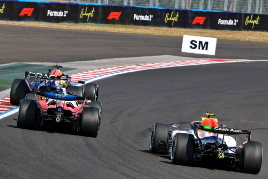 Max Verstappen (NLD) Red Bull Racing RB22 and Lewis Hamilton (GBR) Scuderia Ferrari SF-26 battle for position.
26.07.2026. Formula 1 World Championship, Rd 11, Hungarian Grand Prix, Budapest, Hungary, Race Day.
- www.xpbimages.com, EMail: requests@xpbimages.com © Copyright: Charniaux / XPB Images