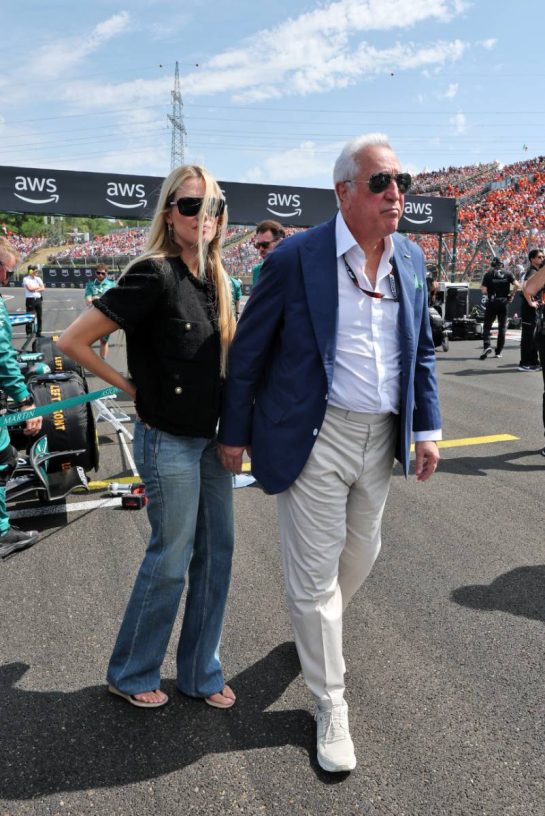 Lawrence Stroll (CDN) Aston Martin F1 Team Investor with his wife Raquel Stroll (BRA) on the grid.
26.07.2026. Formula 1 World Championship, Rd 11, Hungarian Grand Prix, Budapest, Hungary, Race Day.
- www.xpbimages.com, EMail: requests@xpbimages.com © Copyright: Moy / XPB Images