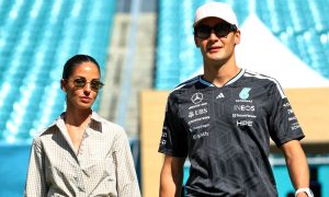 Russell announces engagement in romantic beachside proposal