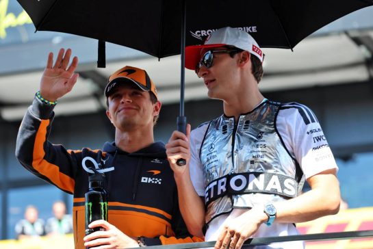 (L to R): Lando Norris (GBR) McLaren F1 Team with George Russell (GBR) Mercedes AMG Formula One Team on the drivers' parade.
13.09.2026. Formula 1 World Championship, Rd 14, Spanish Grand Prix, Madrid, Spain, Race Day.
- www.xpbimages.com, EMail: requests@xpbimages.com © Copyright: Batchelor / XPB Images