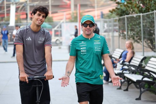 (L to R): Gabriel Bortoleto (BRA) Audi F1 Team with Fernando Alonso (ESP) Aston Martin F1 Team.
24.09.2026. Formula One World Championship, Rd 15, Azerbaijan Grand Prix, Baku, Azerbaijan, Practice Day.
- www.xpbimages.com, EMail: requests@xpbimages.com © Copyright: Batchelor / XPB Images