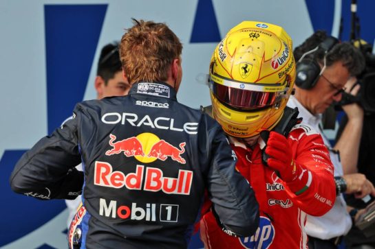 (L to R): Max Verstappen (NLD) Red Bull Racing celebrates his pole position in qualifying parc ferme with second placed Lewis Hamilton (GBR) Scuderia Ferrari.
03.10.2026. Formula 1 World Championship, Rd 16, Bahrain Grand Prix, Sepang, Malaysia, Qualifying Day.
- www.xpbimages.com, EMail: requests@xpbimages.com © Copyright: Batchelor / XPB Images